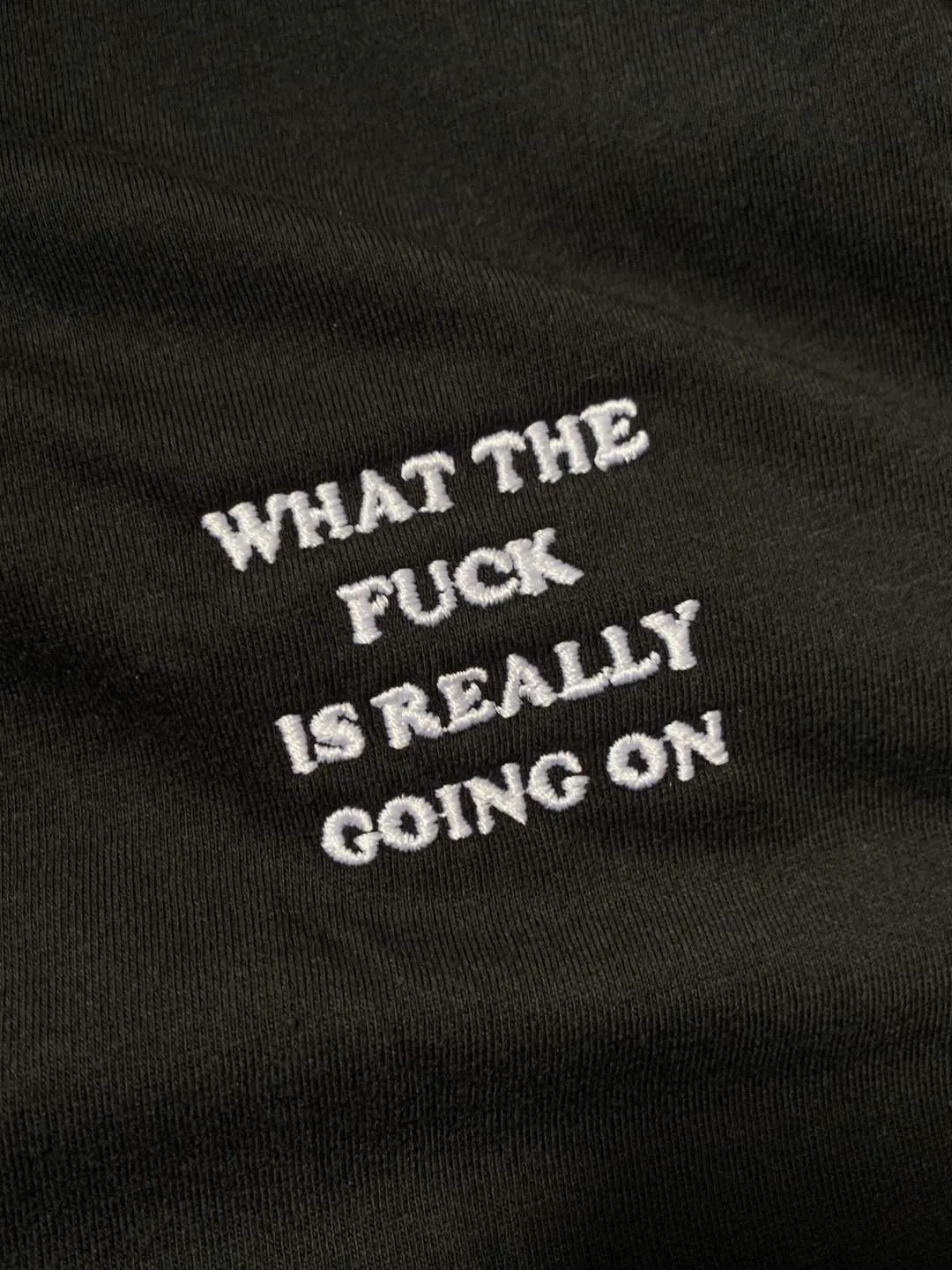 what the fuck is really going on T-Shirt (embroidered)